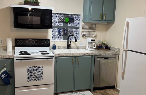 Gulfport Cottage | Charming Cottage in Gulfport overlooking 2 beautiful pondsnWIFInPet Friendly