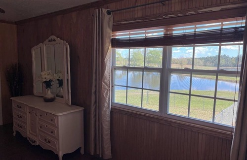 Gulfport Cottage | Charming Cottage in Gulfport overlooking 2 beautiful pondsnWIFInPet Friendly