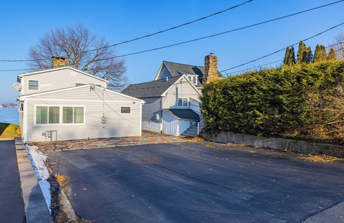 Sodus Point Cottage | Charming Cottage on the Bay and Golf Course with private patio and boat dock.