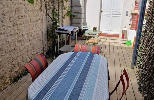 Ouistreham House | Charming cottage with terrace and garden view, 500 m from the beach.