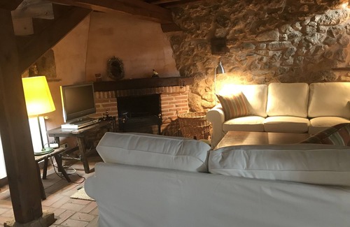 Brieva Cottage | Charming cottage with fireplace perfect for relaxing with family or friends.
