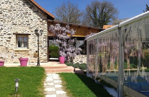 Sarlande Cottage | Charming gîte with swimming pool, Jacuzzi and sauna. Electric charging station