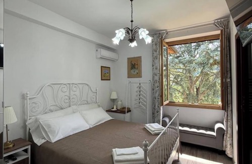 Dicomano House | Charming Guest Room in Villa Casavecchia with City, Garden, and Mountain Views