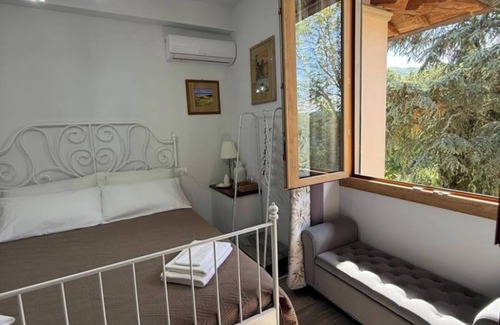 Dicomano House | Charming Guest Room in Villa Casavecchia with City, Garden, and Mountain Views