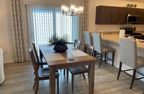 Okahumpka House | Charming home w/spacious kitchen, water view, enclosed lanai, & Pet Friendly