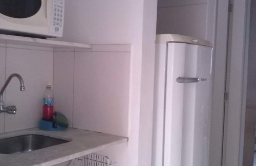 Pitangueiras Apartment | Charming kitnet ideal for couple 100 meters from the beach in Pitangueiras
