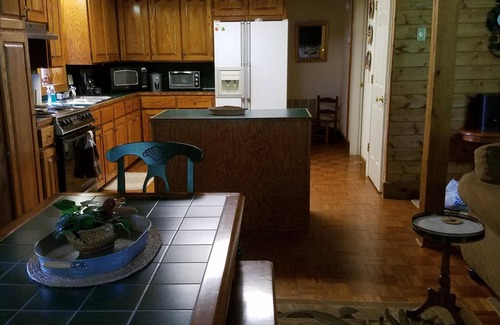 Smith River Cabin | Charming Log Home with Pond on 27 Acres with Mountain Views