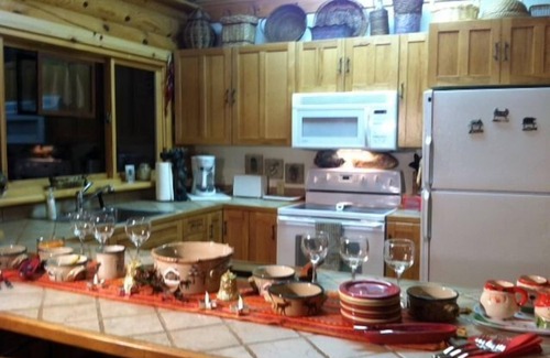 Boyne Falls Cabin | Charming Log House with WIFI Steps Away from Boyne River and enhanched cleaning.