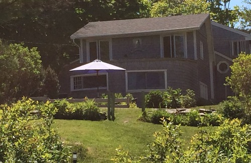 Owls Head Cottage | Charming Sapphire Blue Owls Head Waterfront Cottage