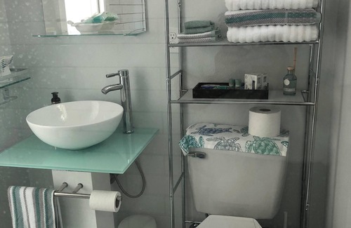Cookson House | Charming shipping container home with lake view and boat ramp.