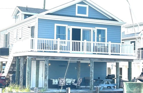 Normandy Beach House | Charming three bedroom 1 1/2 bath home with loft on the lagoon in Lavallette.