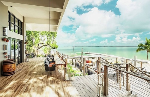 Rock Harbor Hotel | Charming Waterfront Gateway in Key Largo! Outdoor Pool, Beach, Pets Allowed!