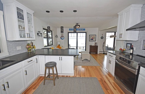 Suttons Bay House | Charming waterfront 5-bedroom home located in the center of everything!