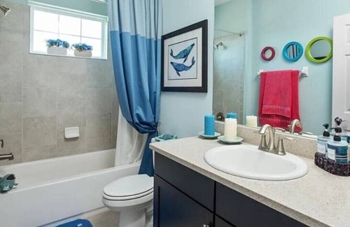Apollo Beach House | Chateau Blue Haven 3-bed 3 Bath in amazing Sunny Apollo Beach w/pool, bar, gym.