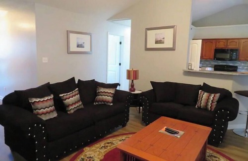 Southaven House | Cheerful 4 Bedroom with indoor fireplce, Fence in yard, Screen in back deck,