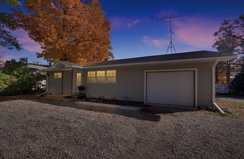 Rapid City Cottage | Cheerful Cottage in Elk Rapids - just steps from the lake!