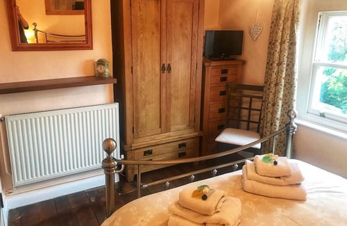 Briston House | Cherry Tree Cottage is set is in the idyllic village of Briston.
