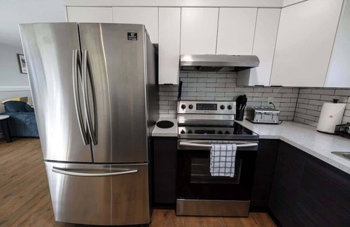 Grande Prairie Apartment | Chic 2BR Suite Smart TV Free WIFI Parking