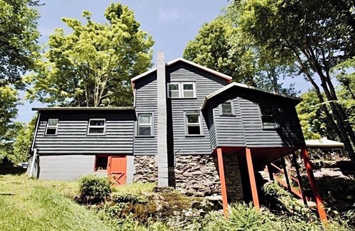 Smallwood Cabin | Chic Treehouse Cabin with Pedal Boat, Hot Tub, BBQ, Fire Pit, SUPs, & Lake Access
