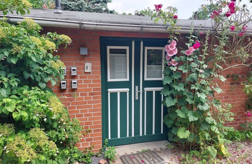 Hasselberg Apartment | Chicken coop - shower room, terrace, garden, sauna, close to the beach, child-friendly