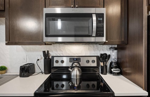 Frisco Original Donation Apartment | Chill & Tone 1-BR Haven w/King Bed, Sofa Bed, Pool & Gym