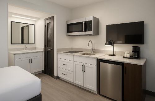 Wheatland Hotel | Citrus Suites Extended Stay OKC Airport