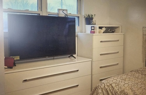 Columbus Apartment | Clean Calm Serene Stylish Home. Screened patio for smoking, cooking or relaxing.