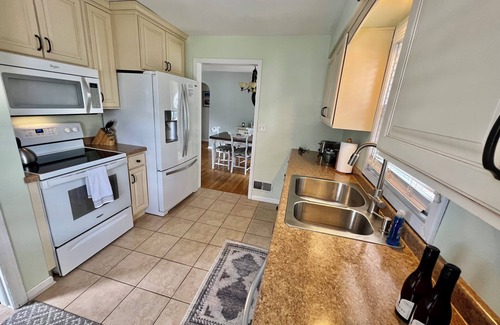 Marquette House | Clean, cozy, updated home walking distance from beach, bike path, and downtown