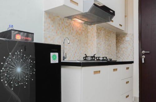 Bekasi Timur Apartment | Clean Studio Apartment at Grand Dhika City By Travelio