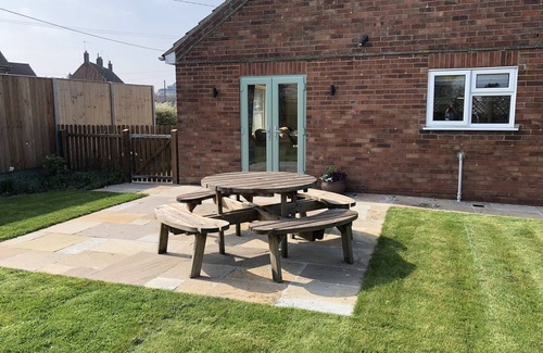 Holt House | Close-by is a spacious pet friendly bungalow close to the Quay - a hidden gem