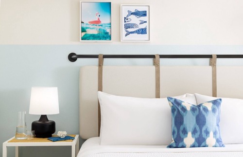 New Town Hotel | Colorful Stay at Blue Flamingo | Poolside Bar, Lawn Games, Music & Fire Pits