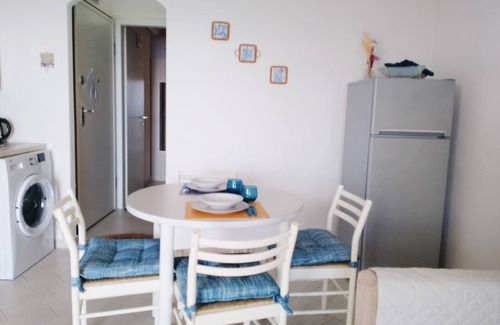 Paduledda Apartment | Comfortable one-bedroom apartment with wide sea view, shared pool and parking space