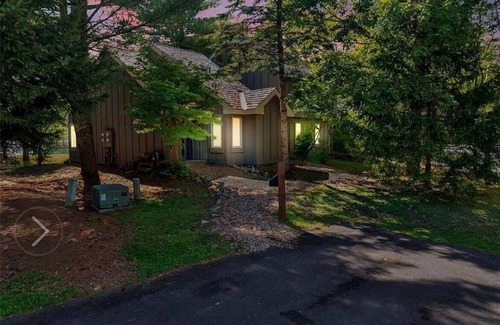 White Haven House | Come relax by the fireplace and enjoy skiing or a walk in the forest by the lake