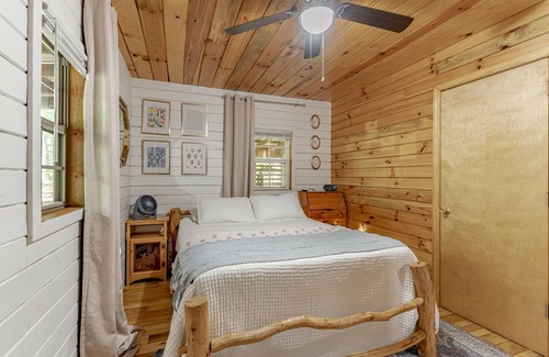 Rogers Cottage | Come relax in our cozy cottage nestled in the woods overlooking Lake Millie.