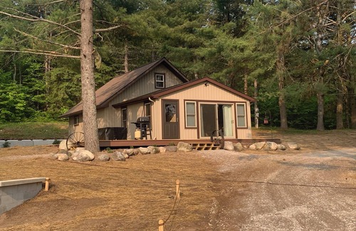 Grayling Cabin | Come take a walk in our woods.