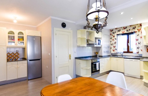 Miengo Villa | Comfortable and spacious villa with communal swimming pool
