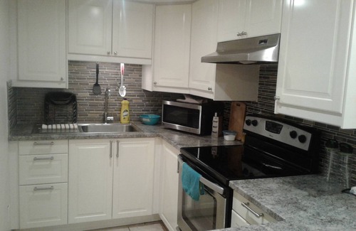 Laval-des-Rapides Apartment | Comfortable apartment, half basement and 3 min walk from Concorde metro station