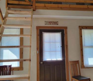 Moscow House | Comfortable Camping Cabins with View of the Cedar River for a Family Weekend Getaway