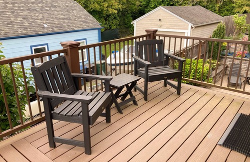 University Place House | Comfortable home with Puget Sound view, decks, garden patio, WiFi & W/D
