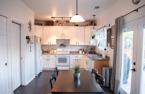 Brighton House | Comfortable home on quiet street with a large backyard, close to DIA