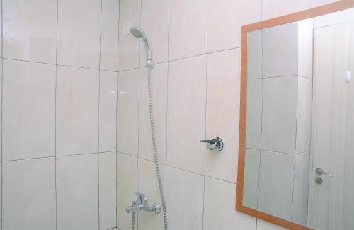 Pekayon Jaya Apartment | Comfortable Studio Grand Kamala Lagoon Apartment By Travelio