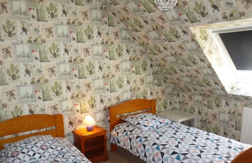 Plougoulm House | Comfortably furnished holiday home with a veranda