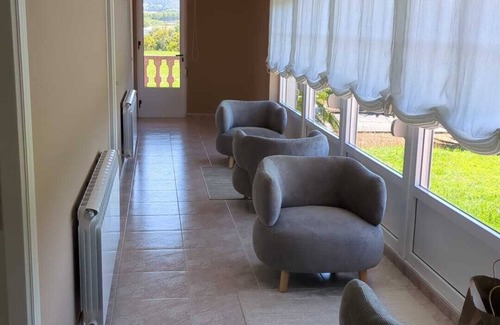 Figueras (Castropol) Apartment | Comfotable room in a restored house with garden and common areas