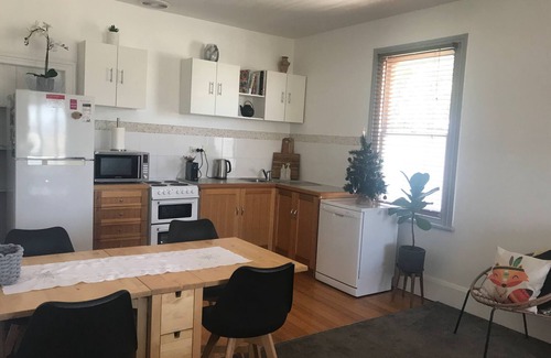 Bellerive Apartment | Comfy home within walking distance to beach, restaurants and Blunderstone area.