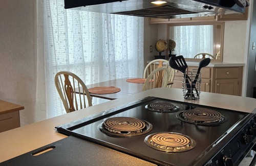 Moorefield House | Comfy Mobile Home located minutes from restaurants and venues.