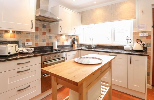 Bodham Cottage | COMPASS COTTAGE, pet friendly, with open fire in Sheringham