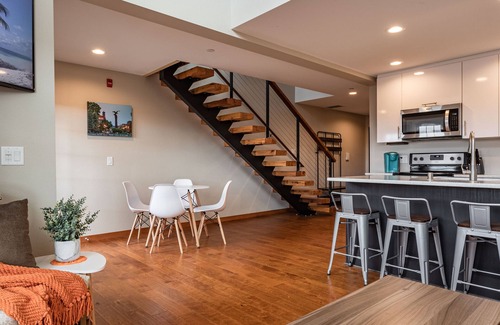 Historic Downtown La Crosse Condo | Condo with balcony views of Oktoberfest! 2 minute walk to fest grounds!