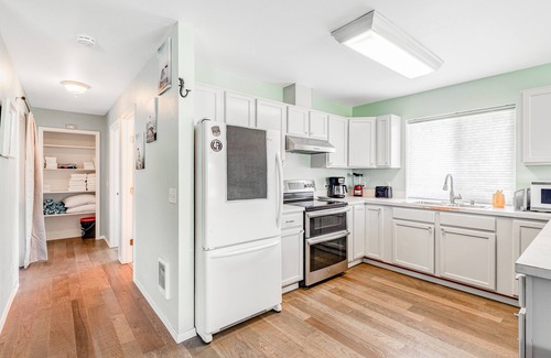 Westport House | Contemporary dog-friendly home with backyard, patio, washer/dryer, pellet stove