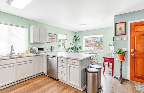 Westport House | Contemporary dog-friendly home with backyard, patio, washer/dryer, pellet stove