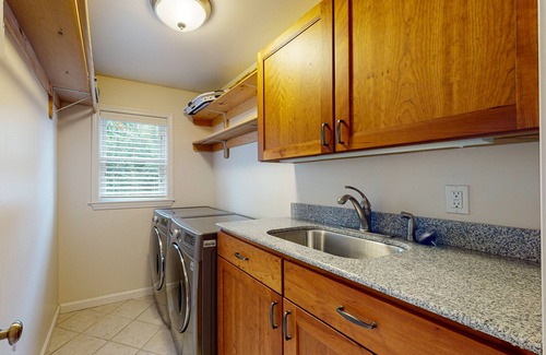 Windham House | Contemporary lake escape with hot tub, swim dock, firepit, & Ping-Pong